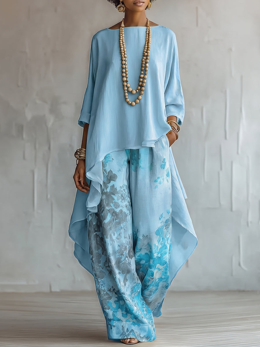 Clara - Conjunto de top asimétrico azul y pantalón ancho con estampado floral.
