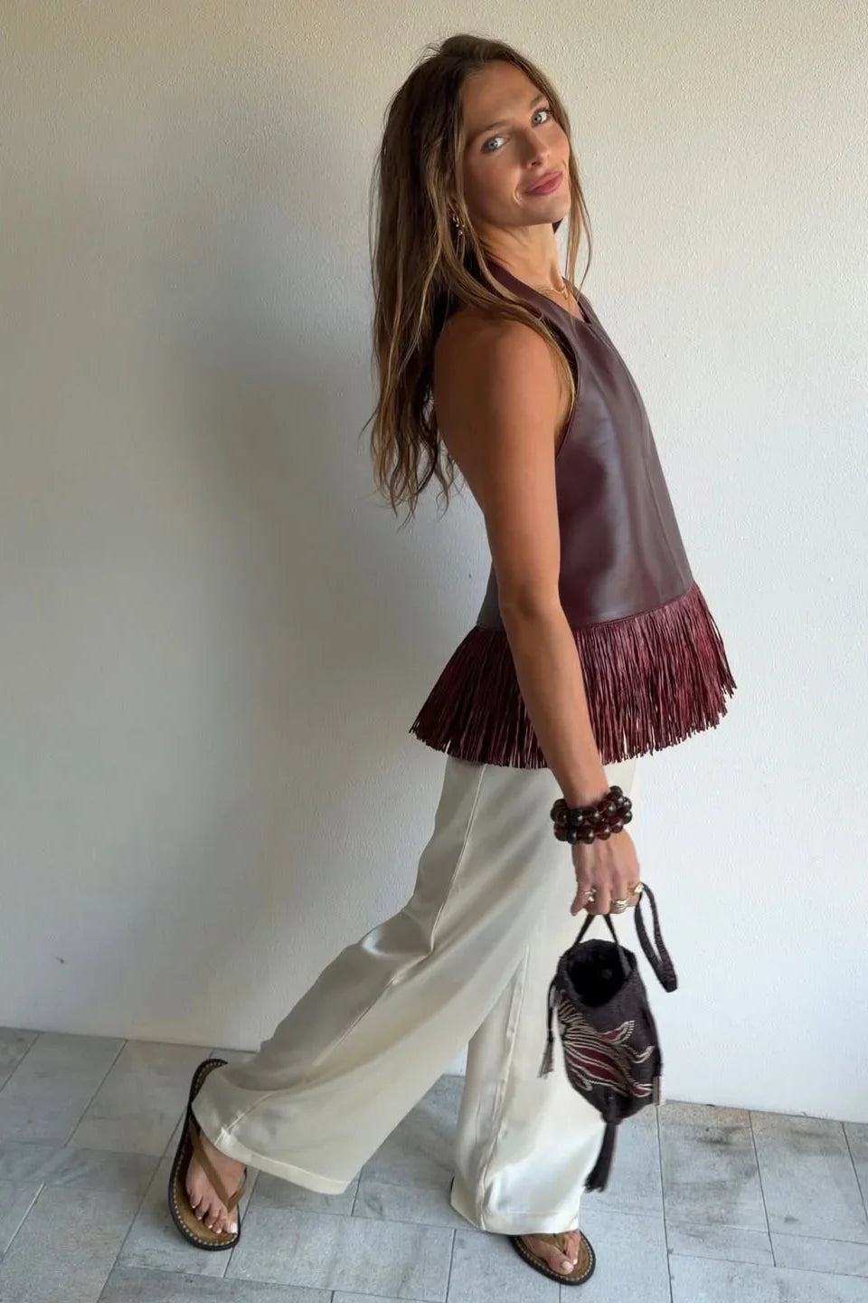 Zyrelia - Top halter efecto piel con flecos y espalda descubierta
