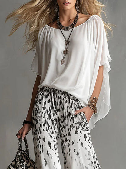 Noa | Conjunto de camiseta blanca y pantalón leopardo